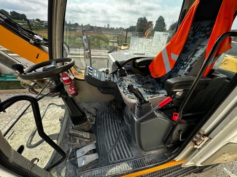 Pelle Liebherr A309 Litronic