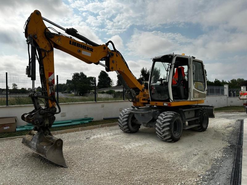 Pelle Liebherr A309 Litronic