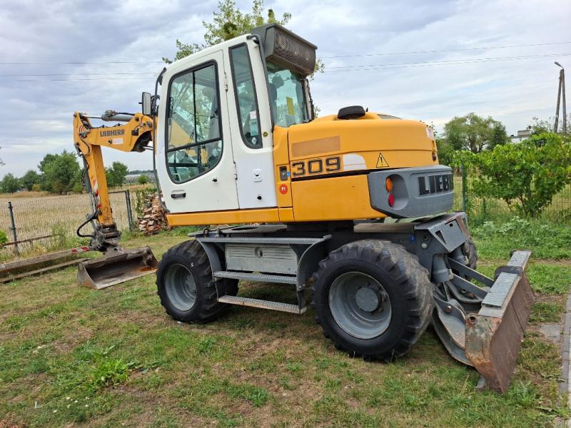 Pelle Liebherr A309 Litronic