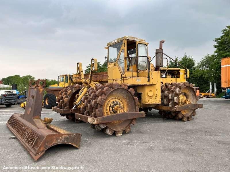 Caterpillar 825 + porte engins 