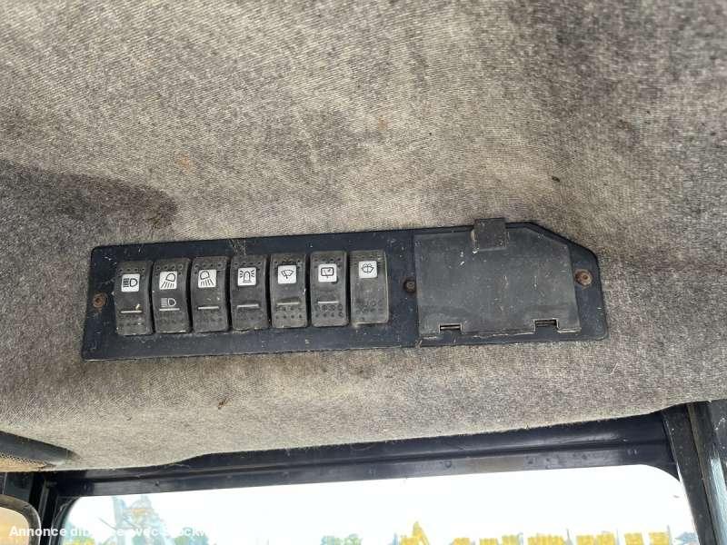 Photo Caterpillar Tractopelle 428C  image 43/47