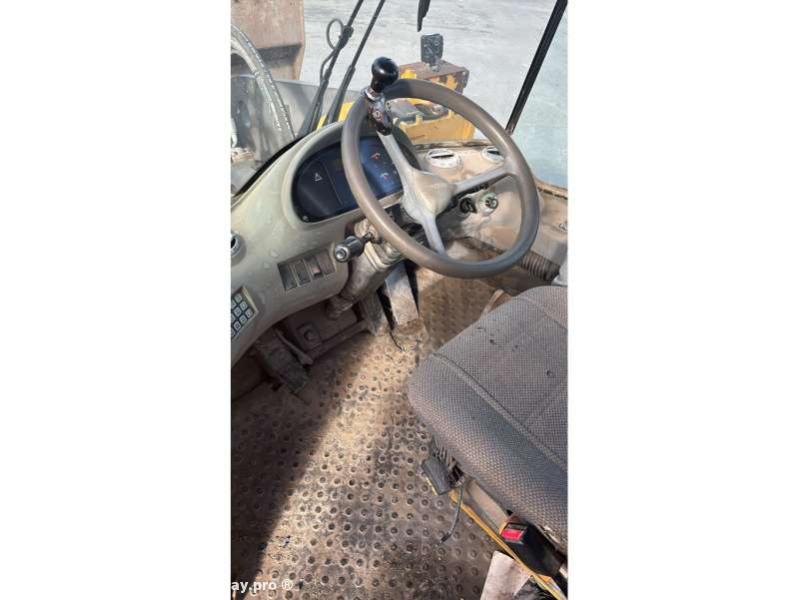 Photo Volvo Chargeur sur Pneus L180E  image 14/17