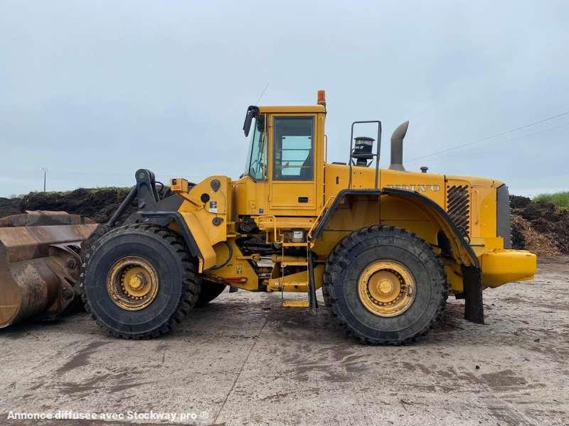 Photo Volvo Chargeur sur Pneus L180E  image 2/17
