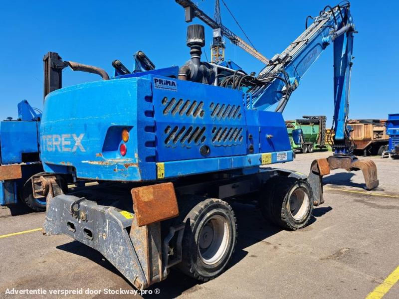Fuchs MHL331E + Grapple 