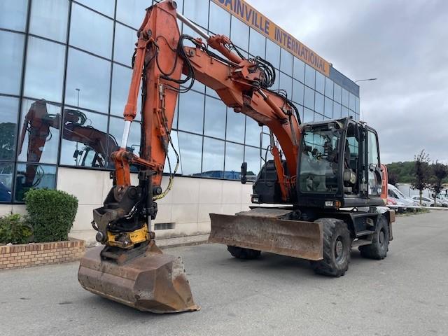 Pelle Hitachi ZX140W-5B Pelle sur pneus