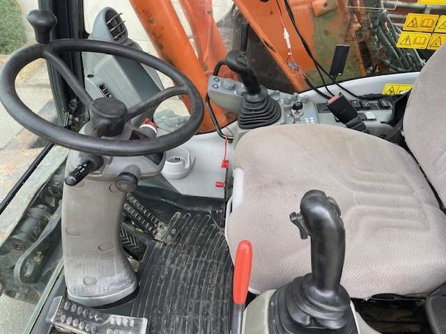 Pelle Hitachi ZX140W-5B Pelle sur pneus