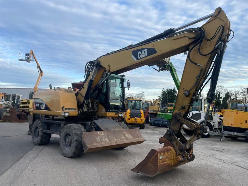 Pelle Caterpillar M316 Pelle sur pneus