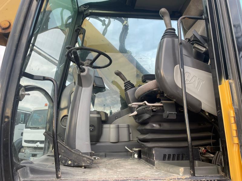 Pelle Caterpillar M316 Pelle sur pneus