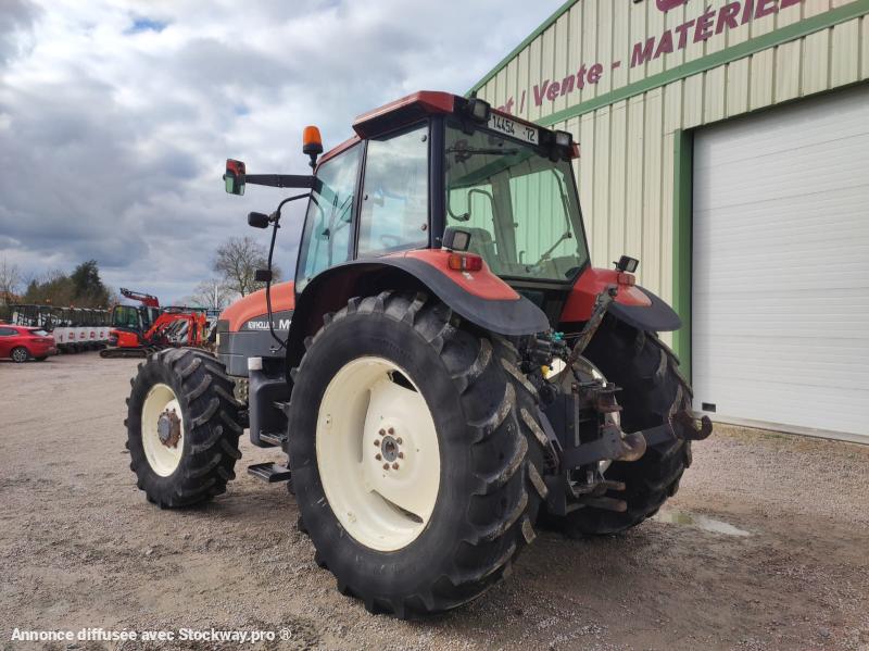 Photo New Holland M100  image 2/13