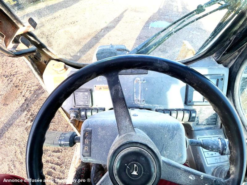 Photo CATERPILLAR TH62 4 ROUES MOTRICES DIRECTIONNELLES 4Tonnes A 7 Mètres image 8/9