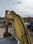 Pelle New Holland E 215 Pelle sur chenilles
