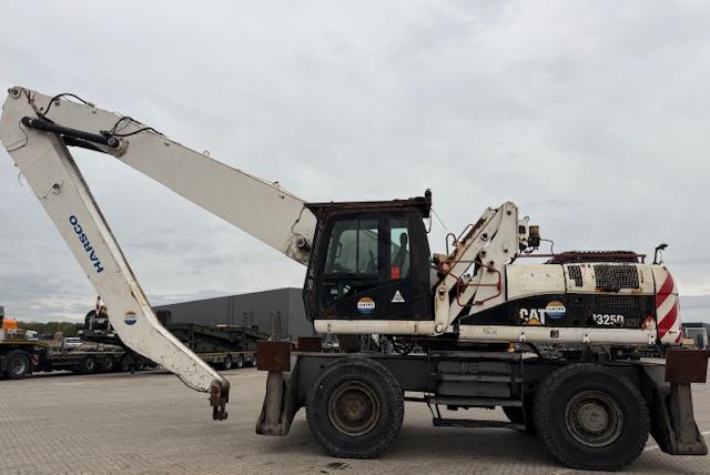 Pelle Caterpillar M325D MH Pelle sur pneus