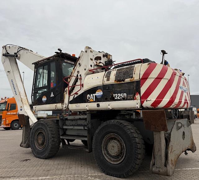 Pelle Caterpillar M325D MH Pelle sur pneus