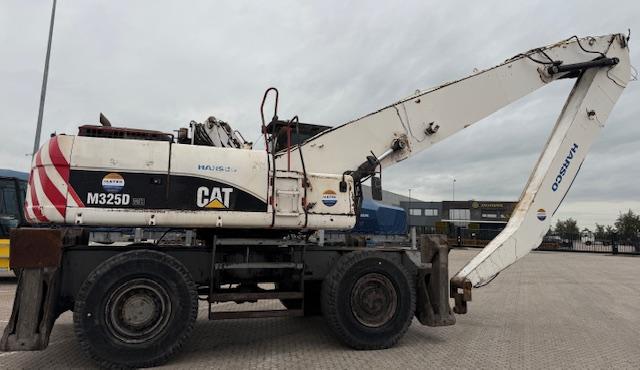 Pelle Caterpillar M325D MH Pelle sur pneus