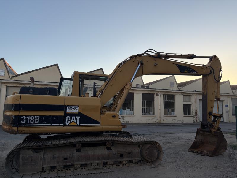 Pelle Caterpillar 318BL Pelle sur chenilles