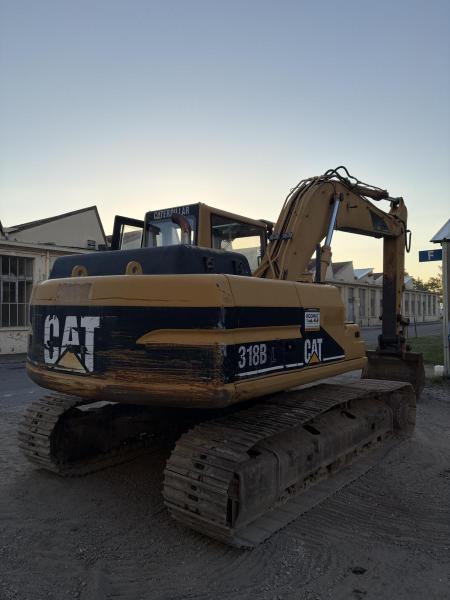 Pelle Caterpillar 318BL Pelle sur chenilles