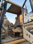 Pelle Caterpillar 318BL Pelle sur chenilles