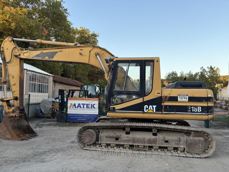 Pelle Caterpillar 318BL Pelle sur chenilles