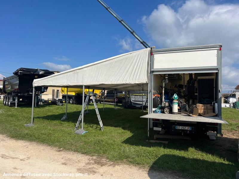 Photo ISUZU Camion SÉRIE N AVEC 2 STRUCTURES CHAPITEAUX  image 9/23