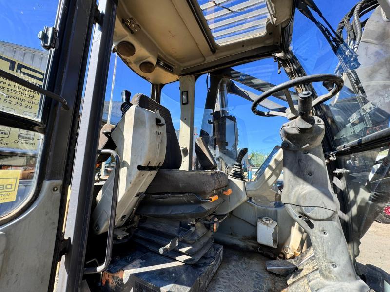 Pelle Mecalac 12 MXT Pelle à pneus articulée 9T