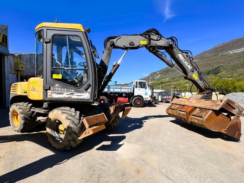 Pelle Mecalac 12 MXT Pelle à pneus articulée 9T