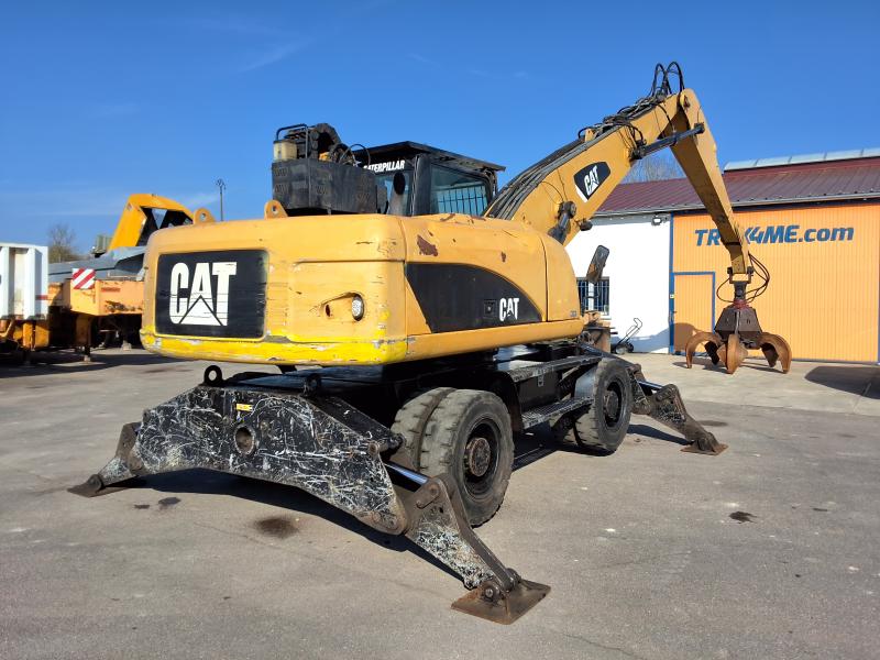 Excavadora Caterpillar M322D MH excavadora de ruedas