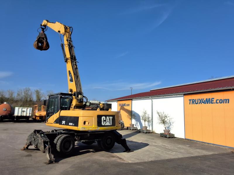 Excavadora Caterpillar M322D MH excavadora de ruedas